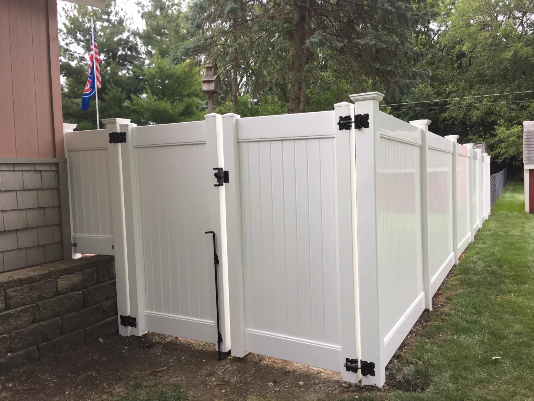 White Vinyl Privacy Fence with Gates installed by Cedar Mountain Fence