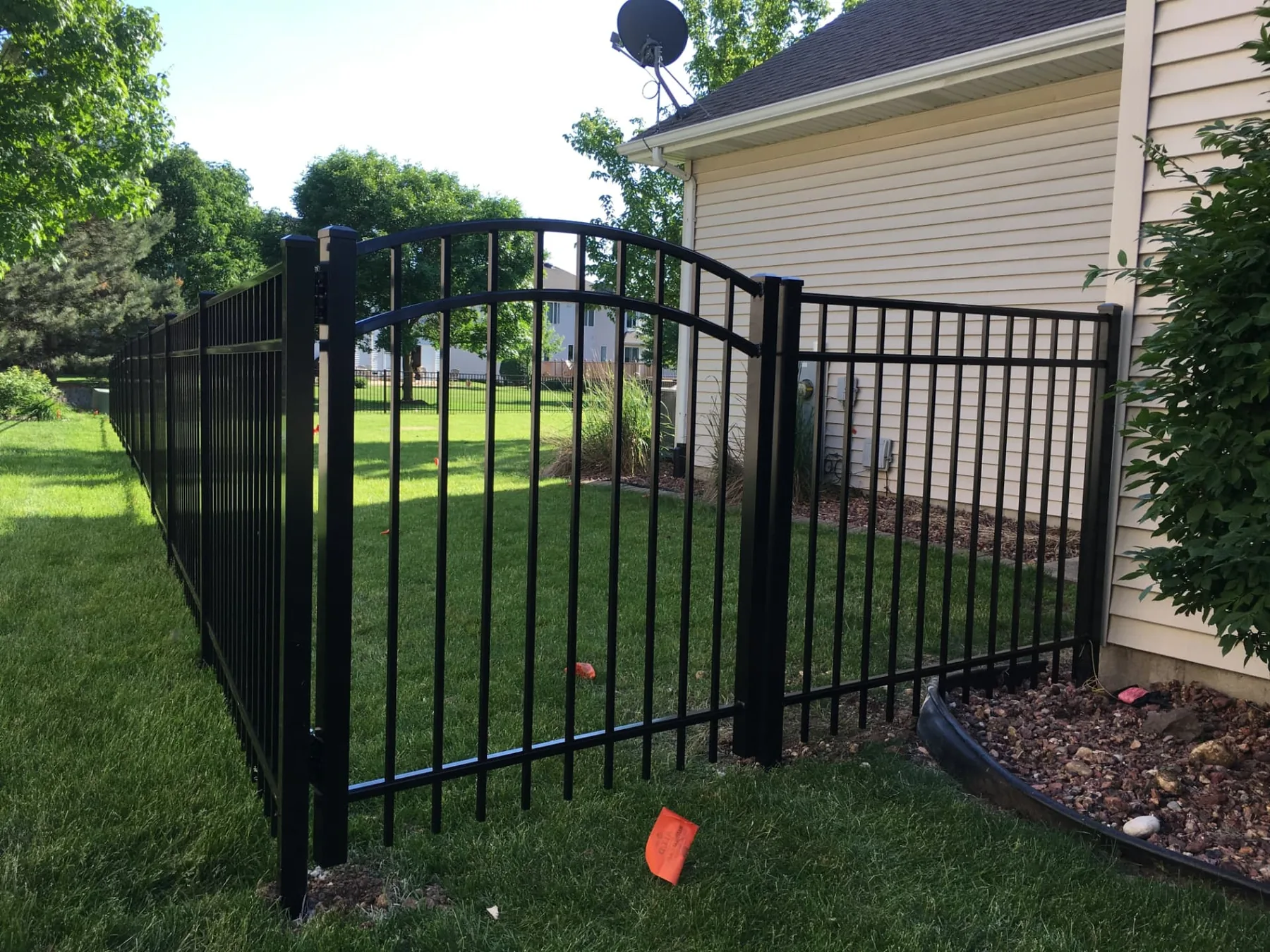Black Aluminum Fence with Walk Gate installed by Cedar Mountain Fence