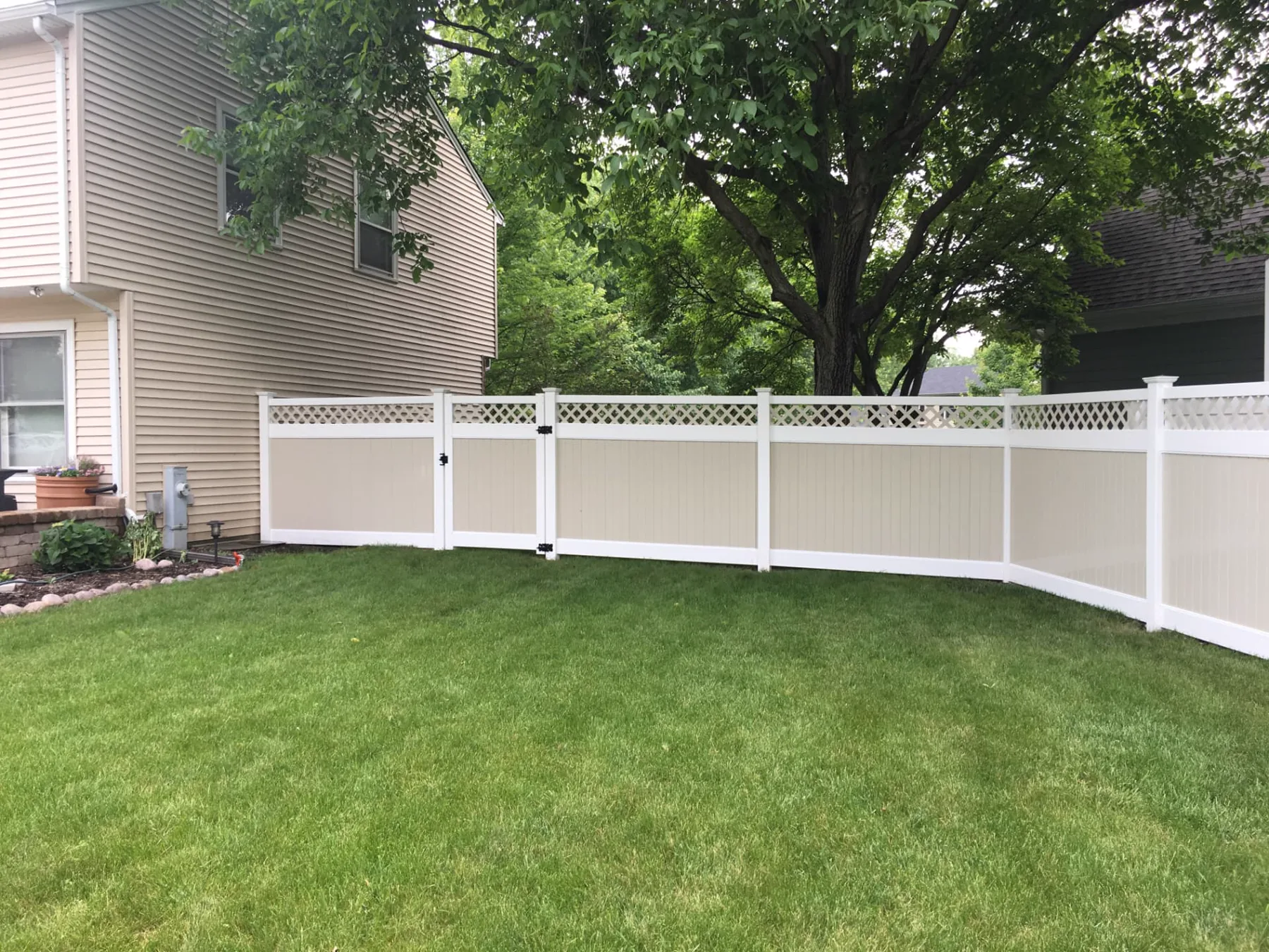 Two-Tone Vinyl Fence Backyard Enclosure installed by Cedar Mountain Fence