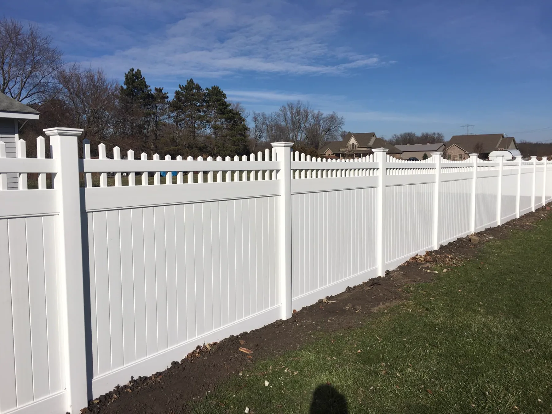 Decorative Picket-Top Vinyl Privacy Fence installed by Cedar Mountain Fence